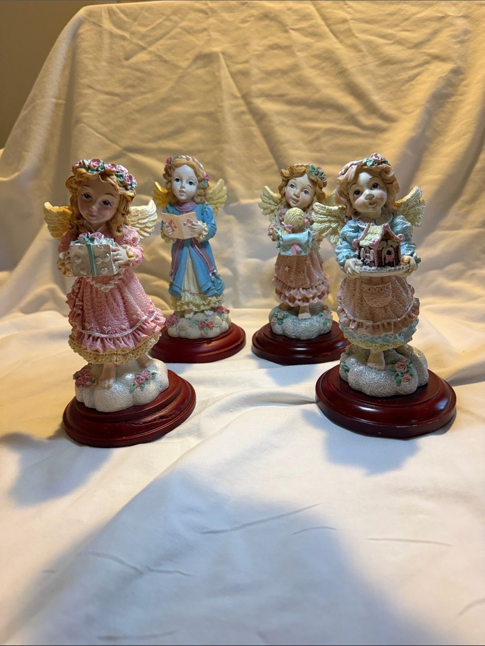 Set of 4 Angel Figurines Pink & Blue Decor